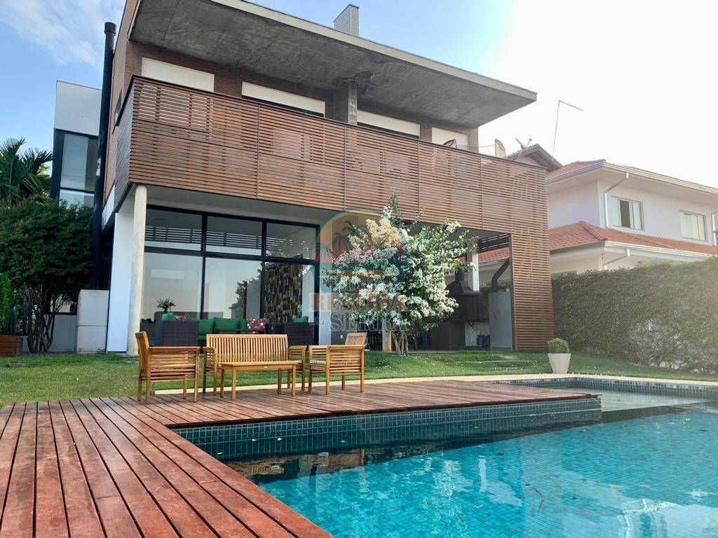 Casa de Condomínio à venda e aluguel com 4 quartos, 562m² - Foto 2